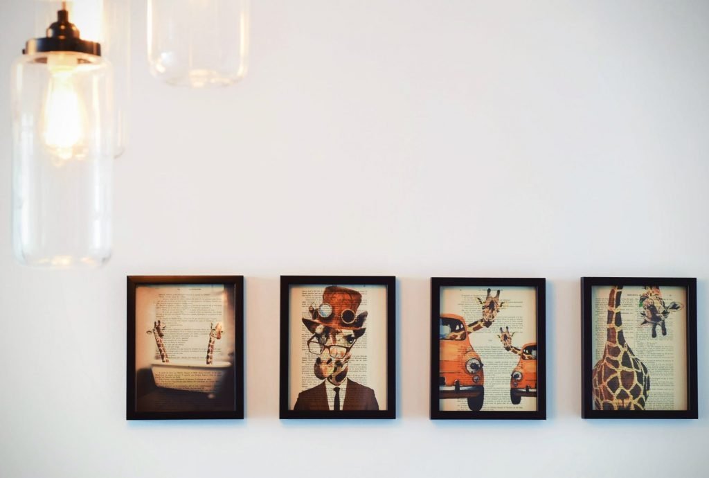 Image of Four Paintings on Wall