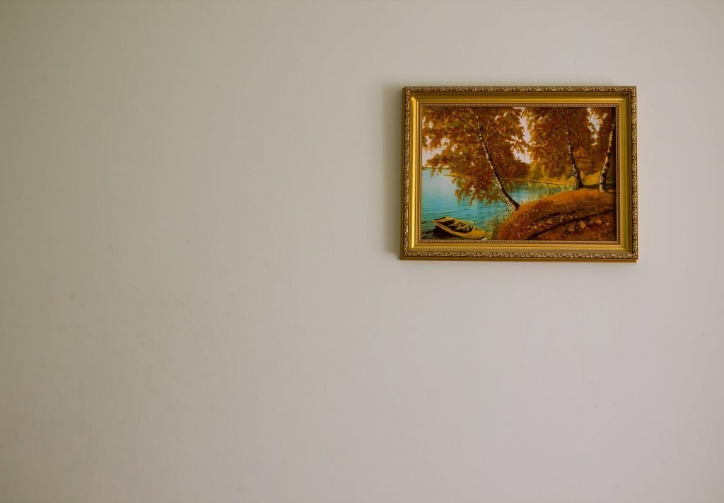 Image of A Single Gold Framed Painting On The Wall