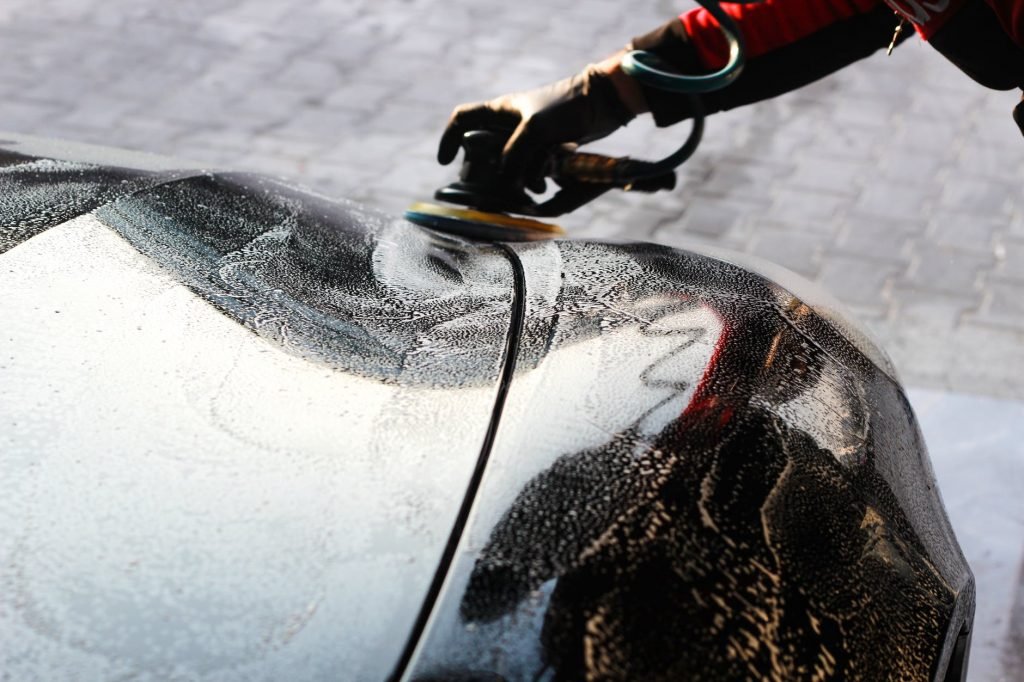 Image of Person Waxing a Car