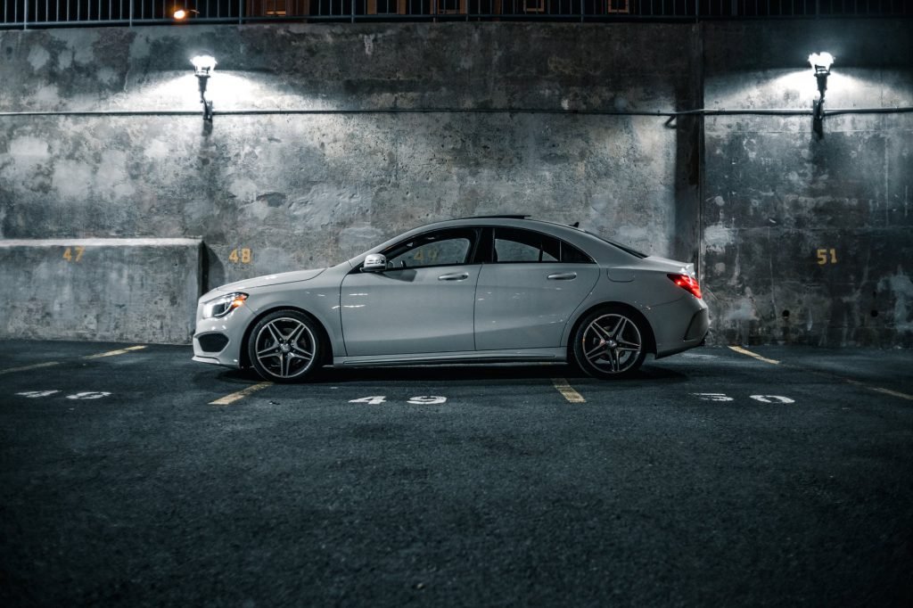 Image of Luxury vehicle by shabby grey wall