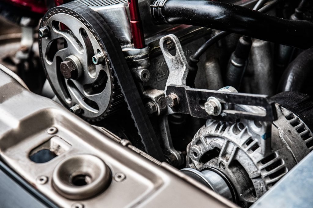 Image of Close-up Photo of Black and Silver Car Engine