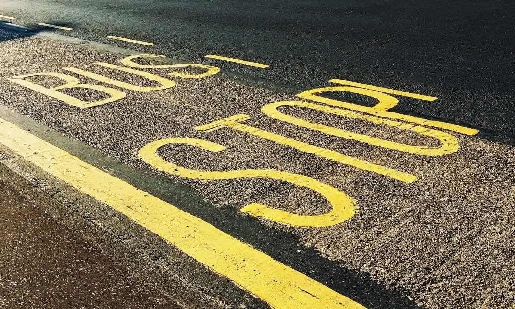 Image of Bus Stop Printed on Asphalt Road