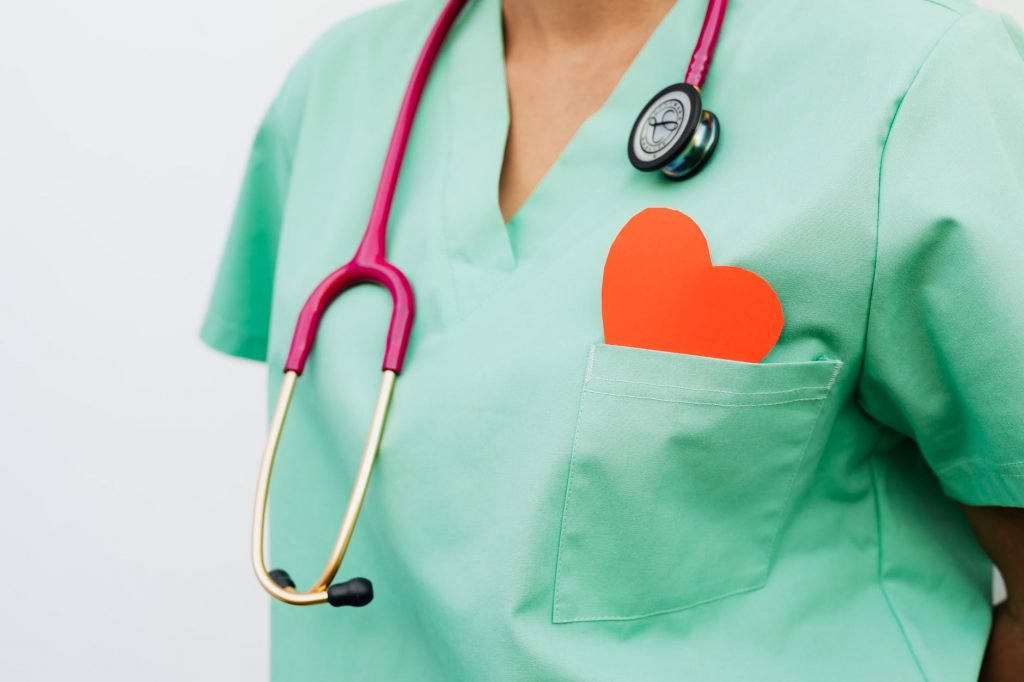 Image of Person Wearing Blue and Black Stethoscope