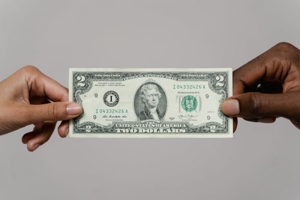 Image of Handing Out Money