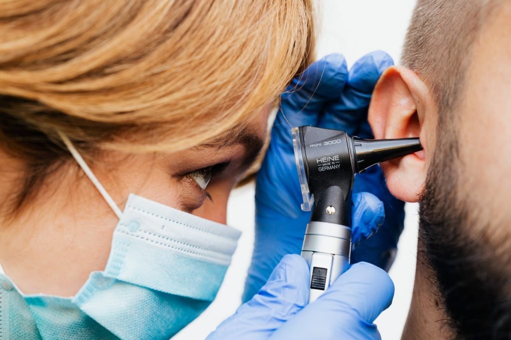 Image of A Doctor doing an Ear Examination