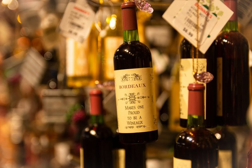 Image of Depth Photography of Green Labeled Bottle