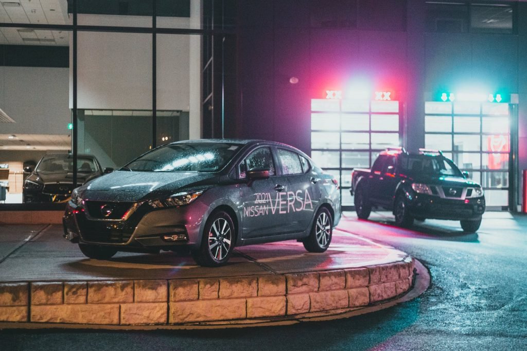 Image of Modern black automobiles in car showroom